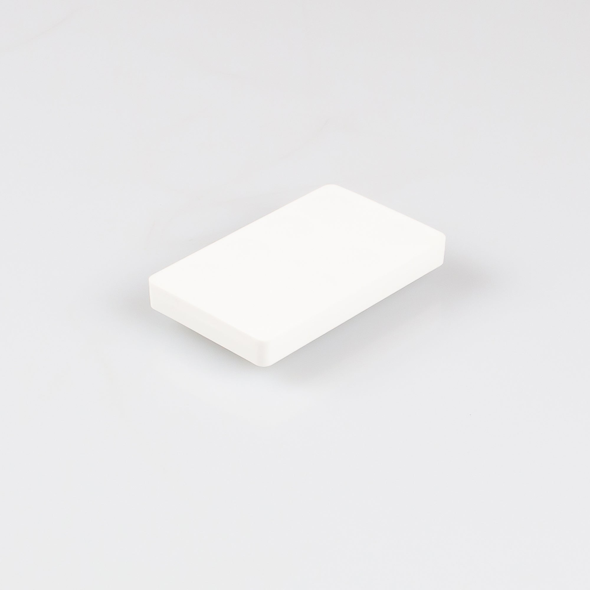 Gummiertes weißes Magnetsystem 74x45x8,5mm 2x Gewindebuchse M5 Haftfläche